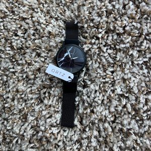 Magnetic marble face watch